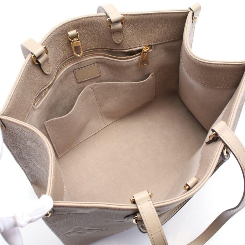 Louis Vuitton OnTheGo MM Monogram Empreinte Tote Bag - Picture 3 of 6